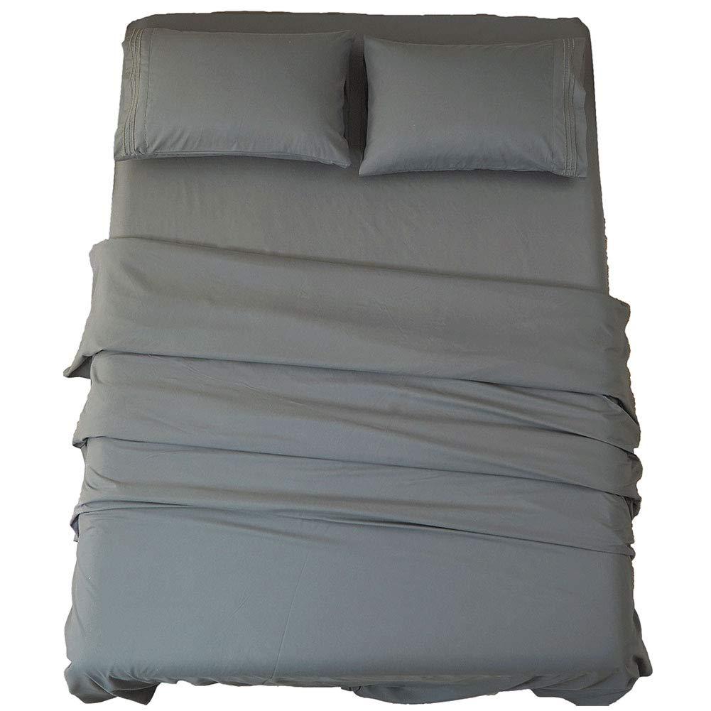 Sonoro Kate Bed Sheet Set in Dark Grey on a bed
