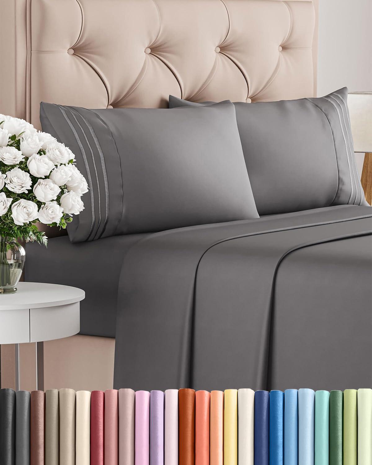 CGK Unlimited Queen Size 4 Piece Sheet Set in dark grey, showing fitted sheet with deep pockets and soft microfiber texture