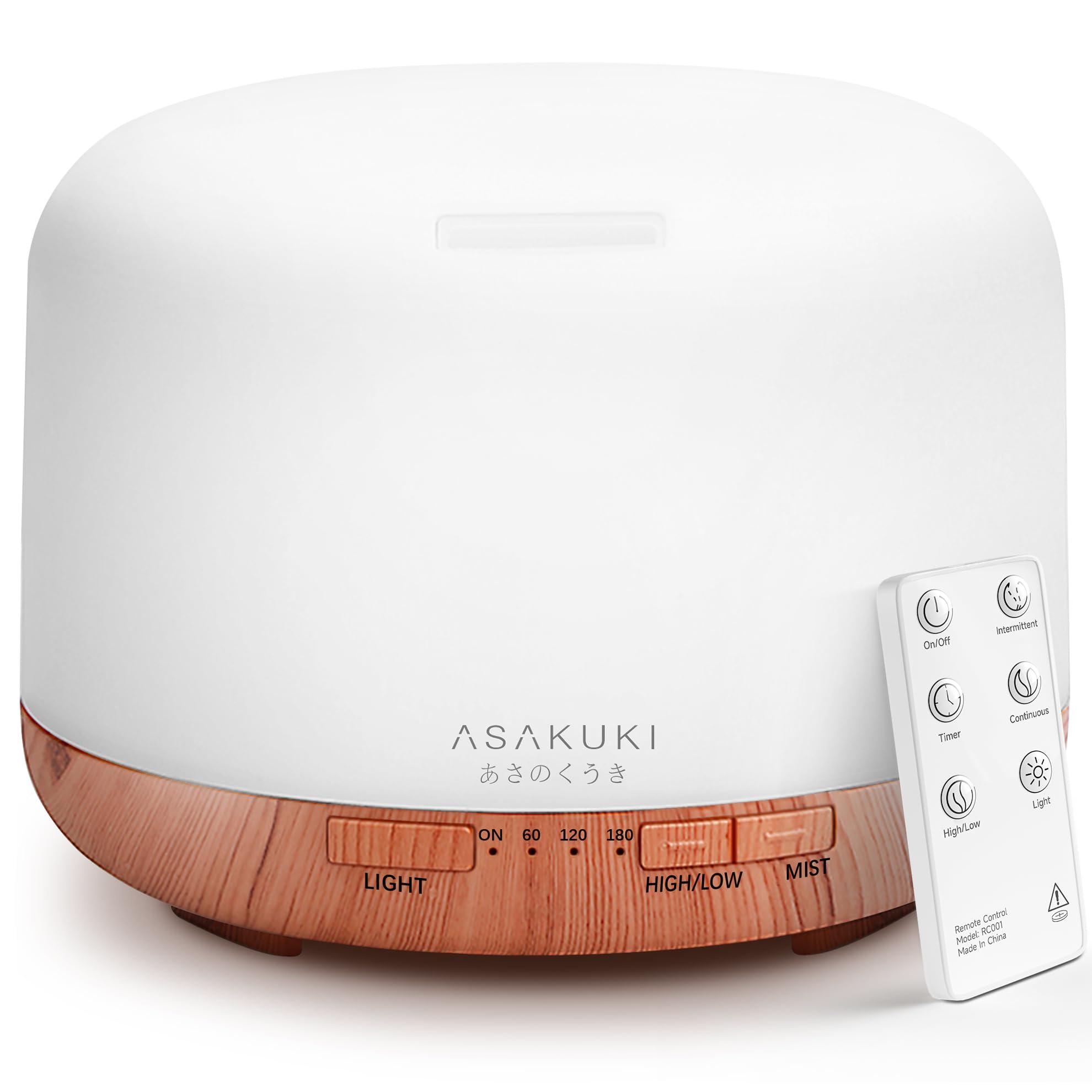 ASAKUKI Essential Oil Diffuser with LED lights on a nightstand
