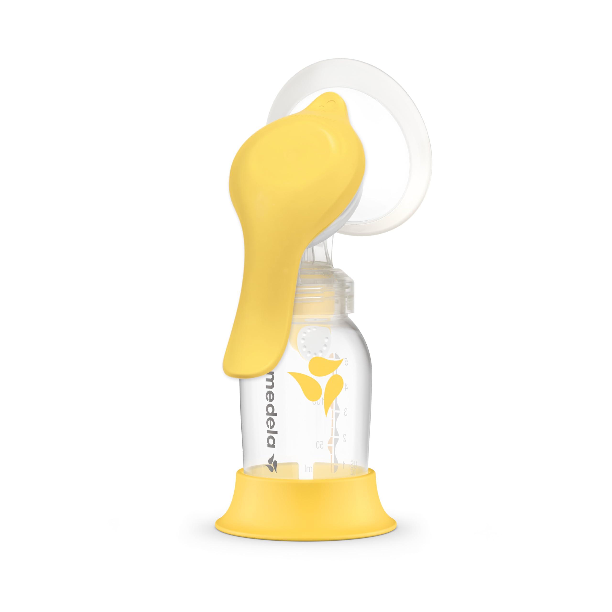 Medela Harmony Manual Breast Pump with ergonomic handle on white background
