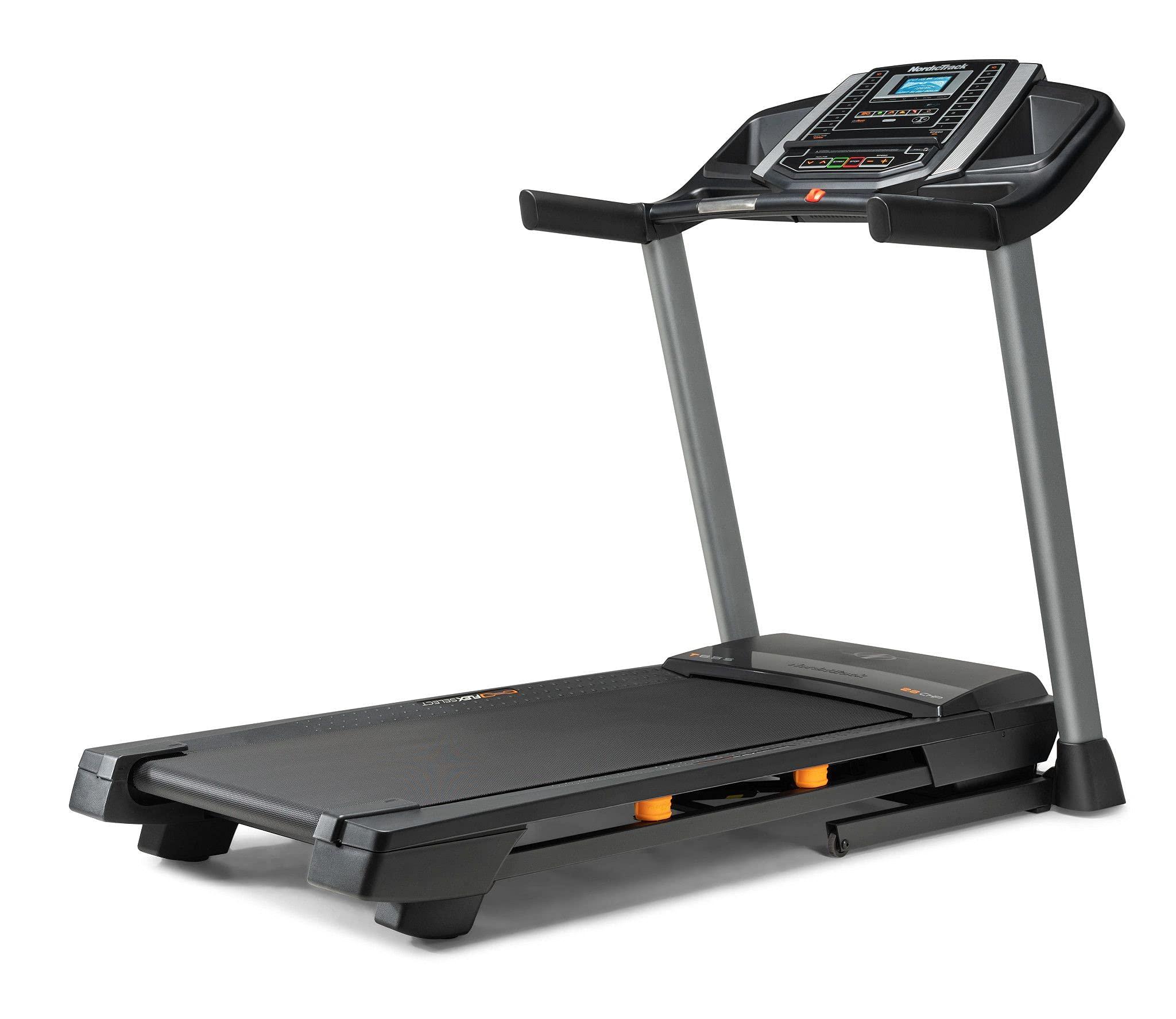 NordicTrack T Series treadmill folded against wall in home gym setting