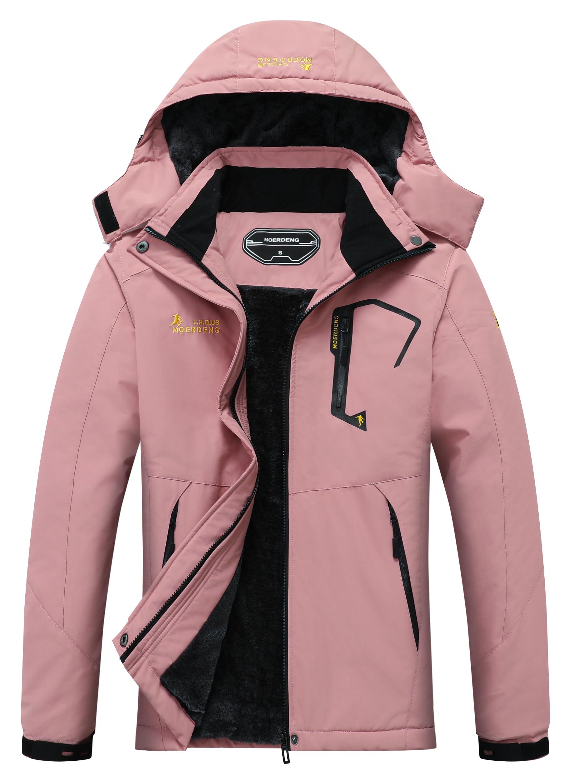MOERDENG Women's Waterproof Ski Jacket in action, hood up, in snowy conditions