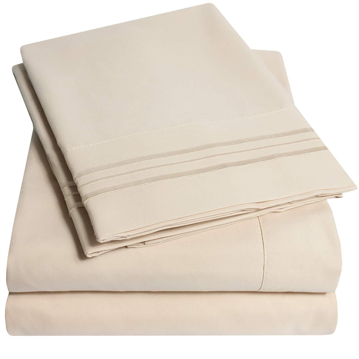 Sweet Home Collection 1500 Supreme Queen sheet set in beige folded on a bed
