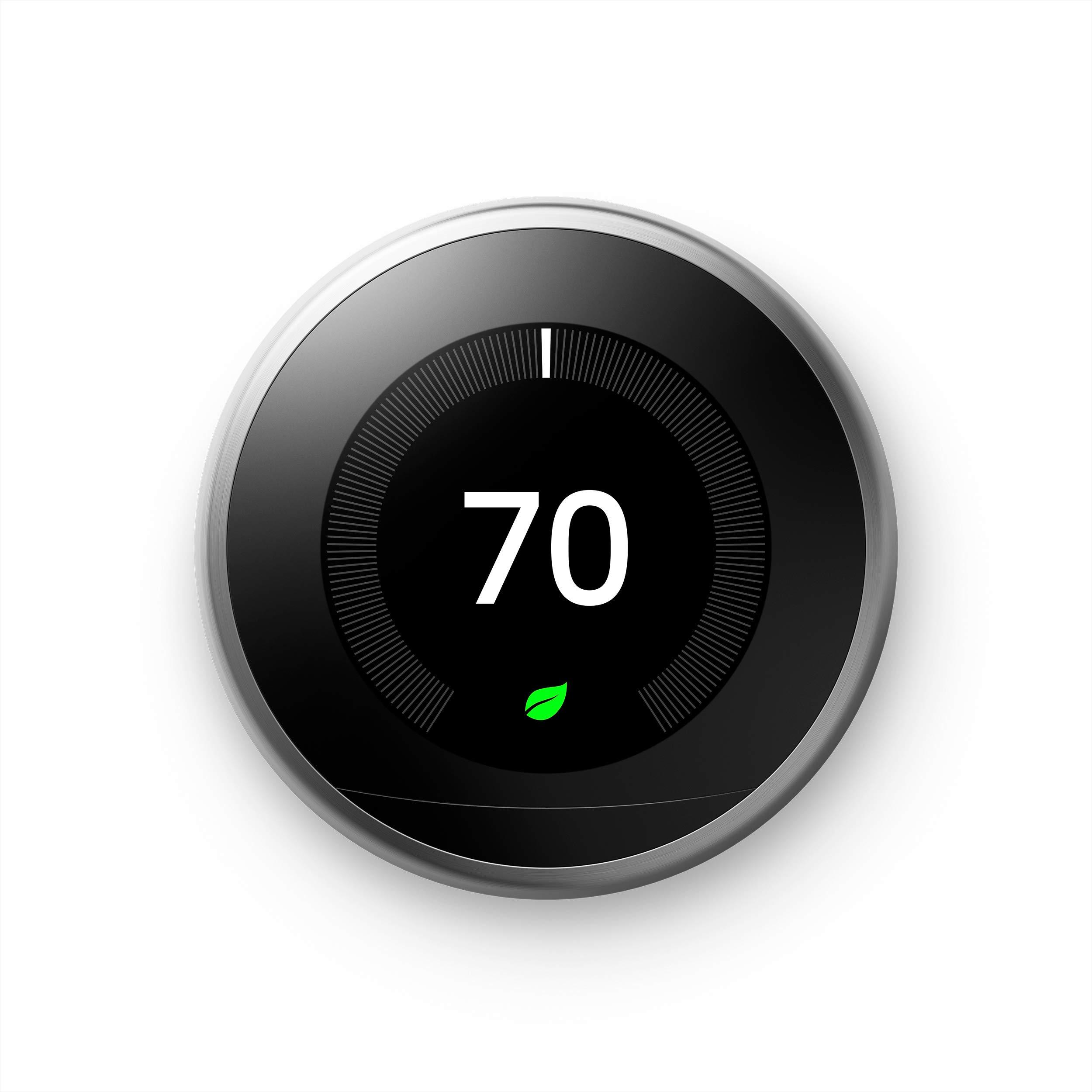 Nest T3016US Programmable Thermostat in stainless steel mounted on wall