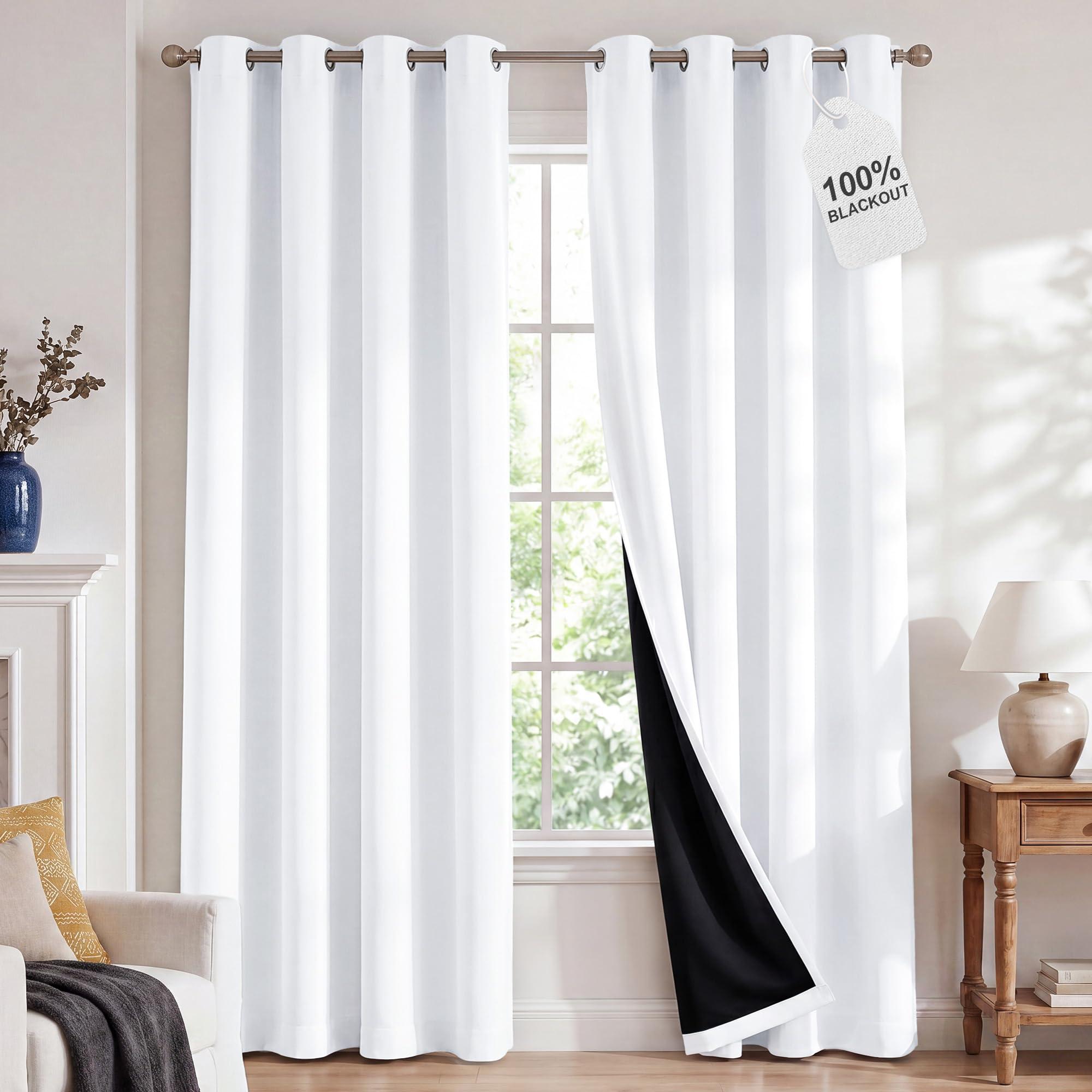 NICETOWN 100% Blackout Window Curtain Panels in white, floor-length, grommet top