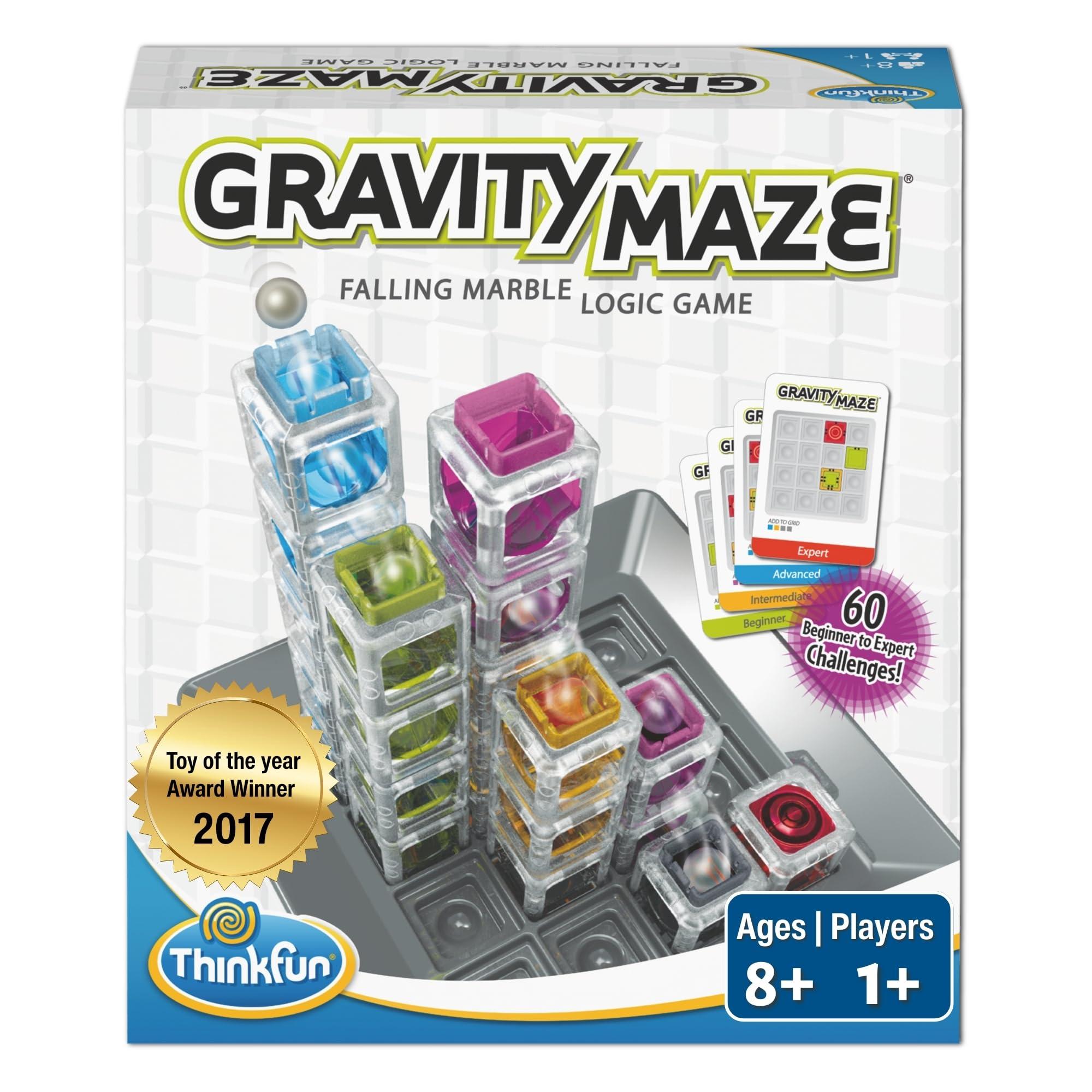 ThinkFun Gravity Maze marble logic game with clear towers and colorful challenge card on table