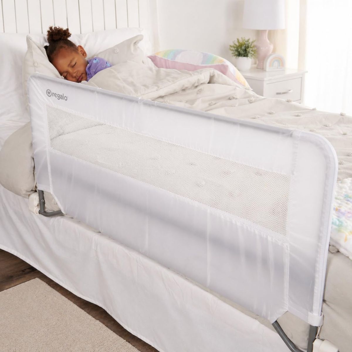 Regalo Swing Down Toddler Bed Rail Guard installed on a twin bed