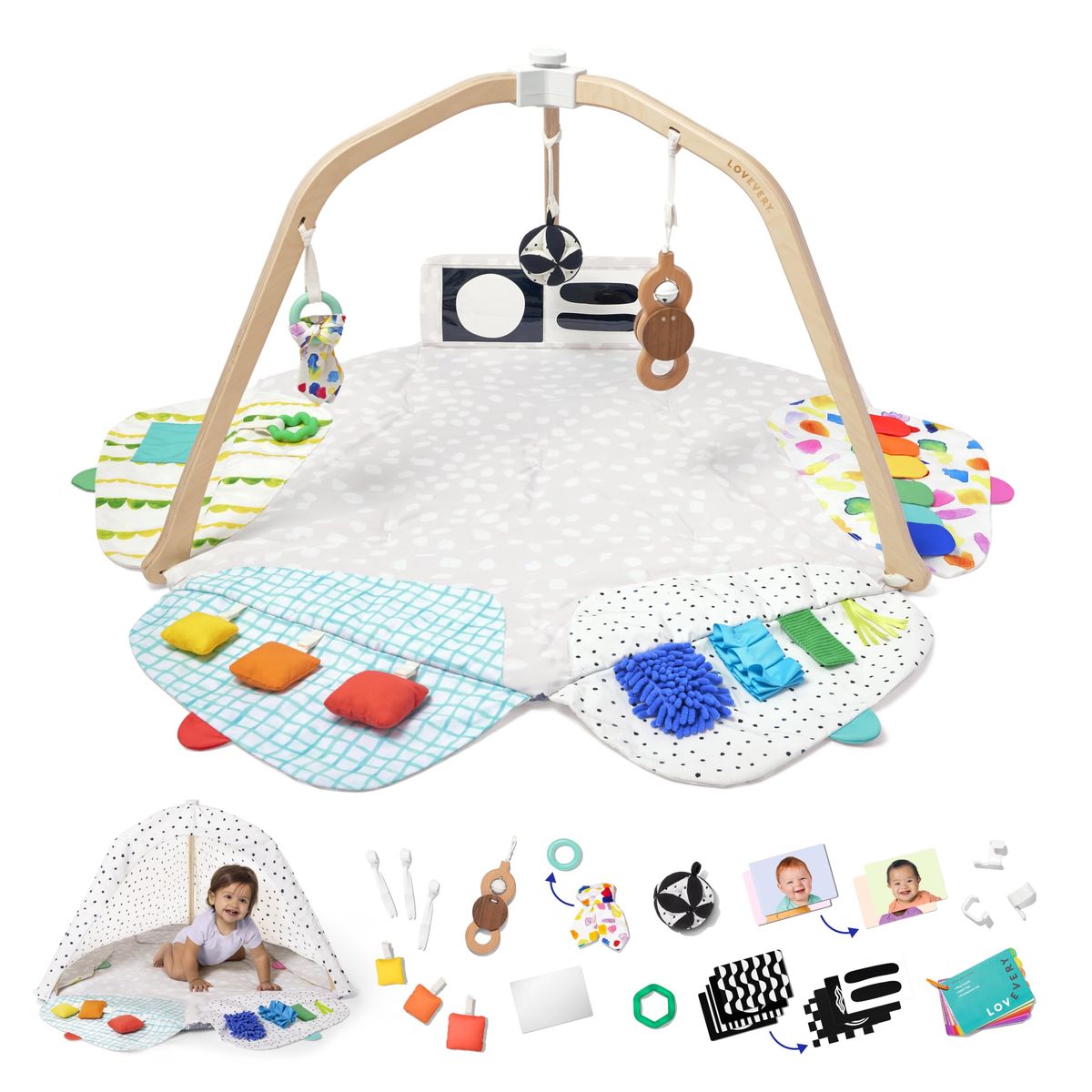 Lovevery Play Gym with baby under wooden arches