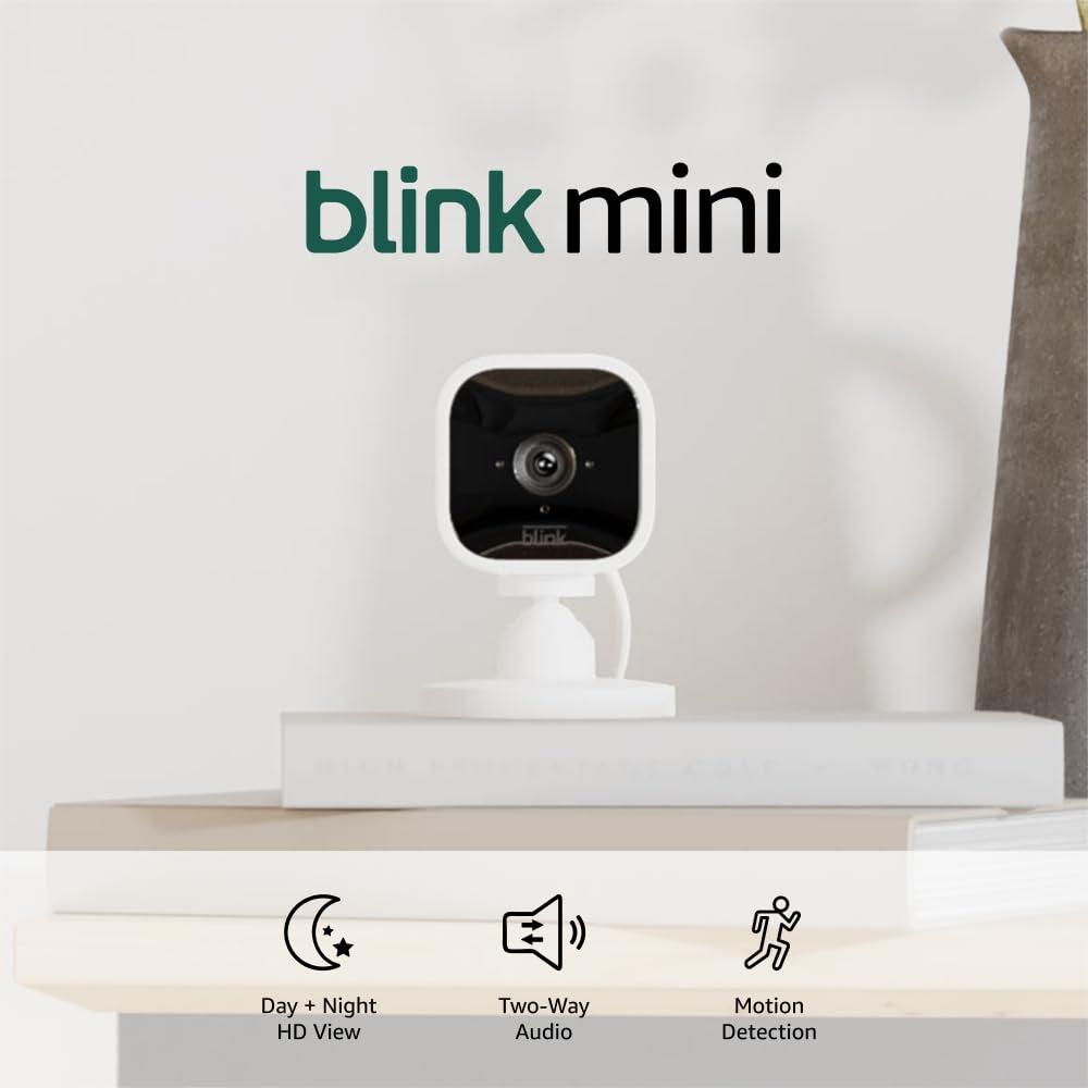 Blink Mini compact indoor plug-in smart security camera in white