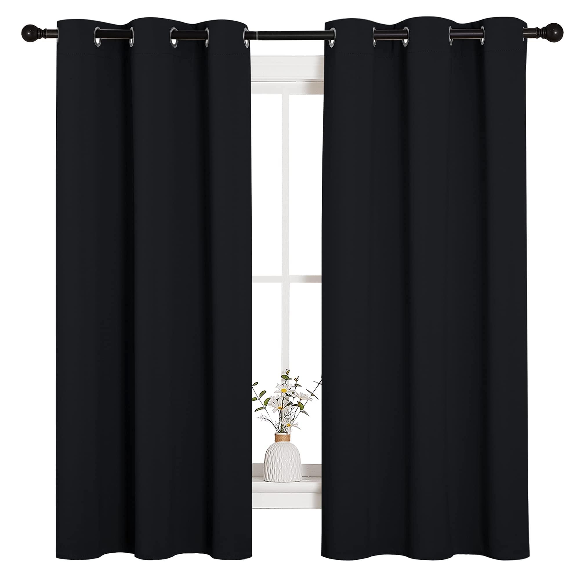 NICETOWN Black Blackout Curtains, grommet top, 2 panels on a window