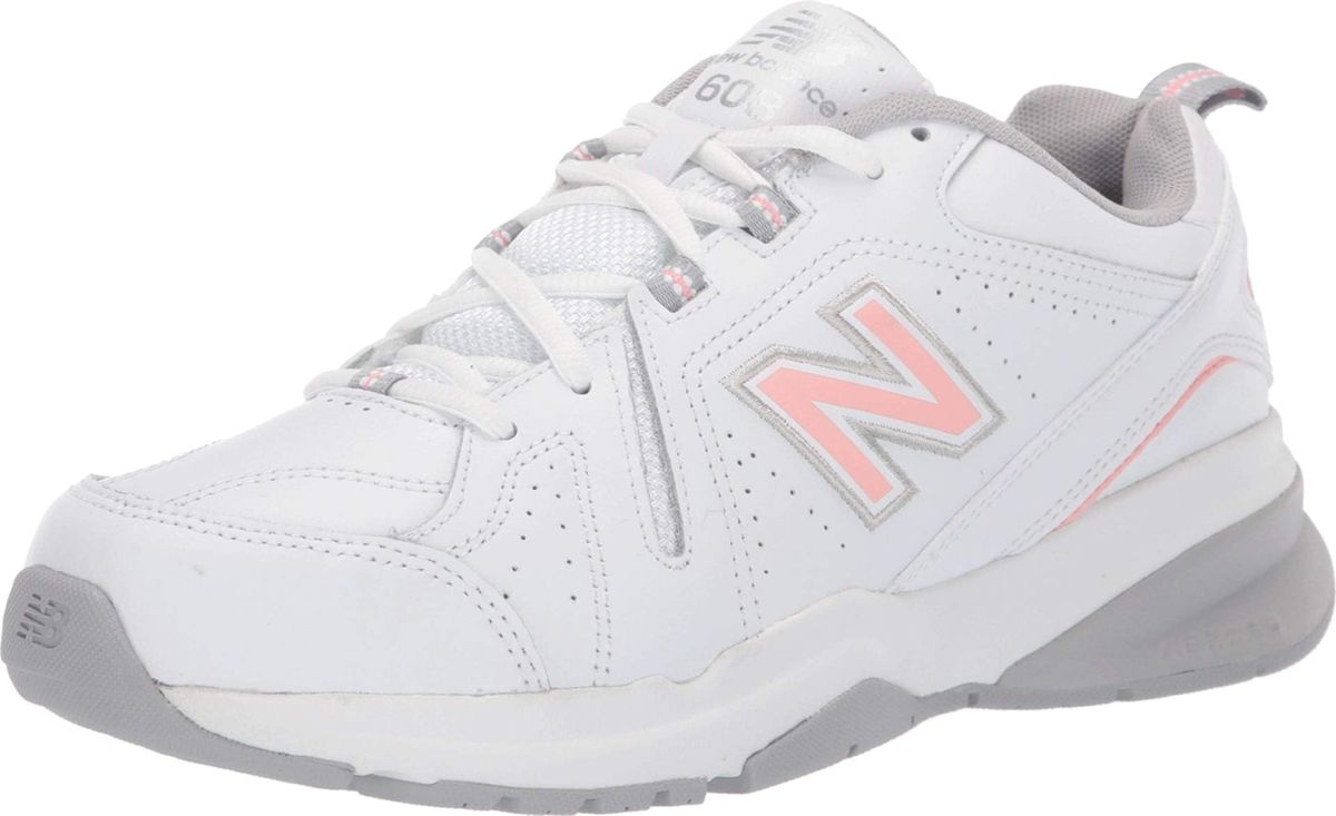 New Balance Women’s 608 V5 Casual Comfort Cross Trainer in white/pink, on a white background.