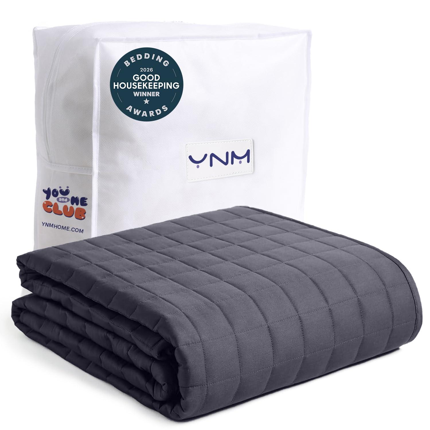 YnM 15lbs weighted blanket in dark grey microfiber laid flat on bed