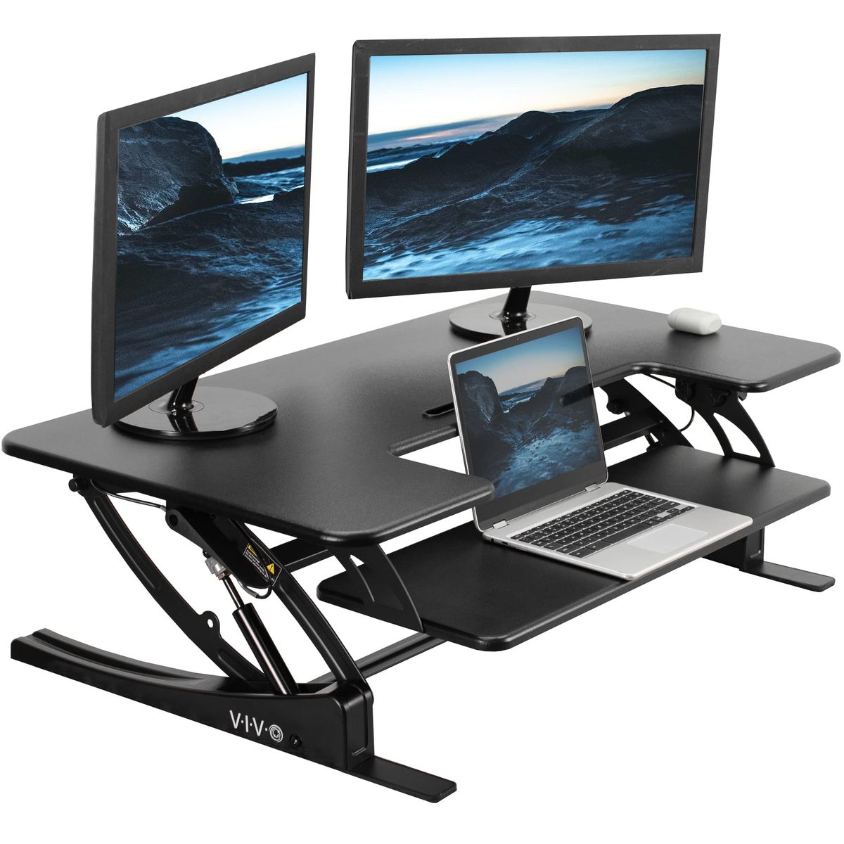 VIVO 42 inch Height Adjustable Stand Up Desk Converter with dual monitors on top of an existing desk