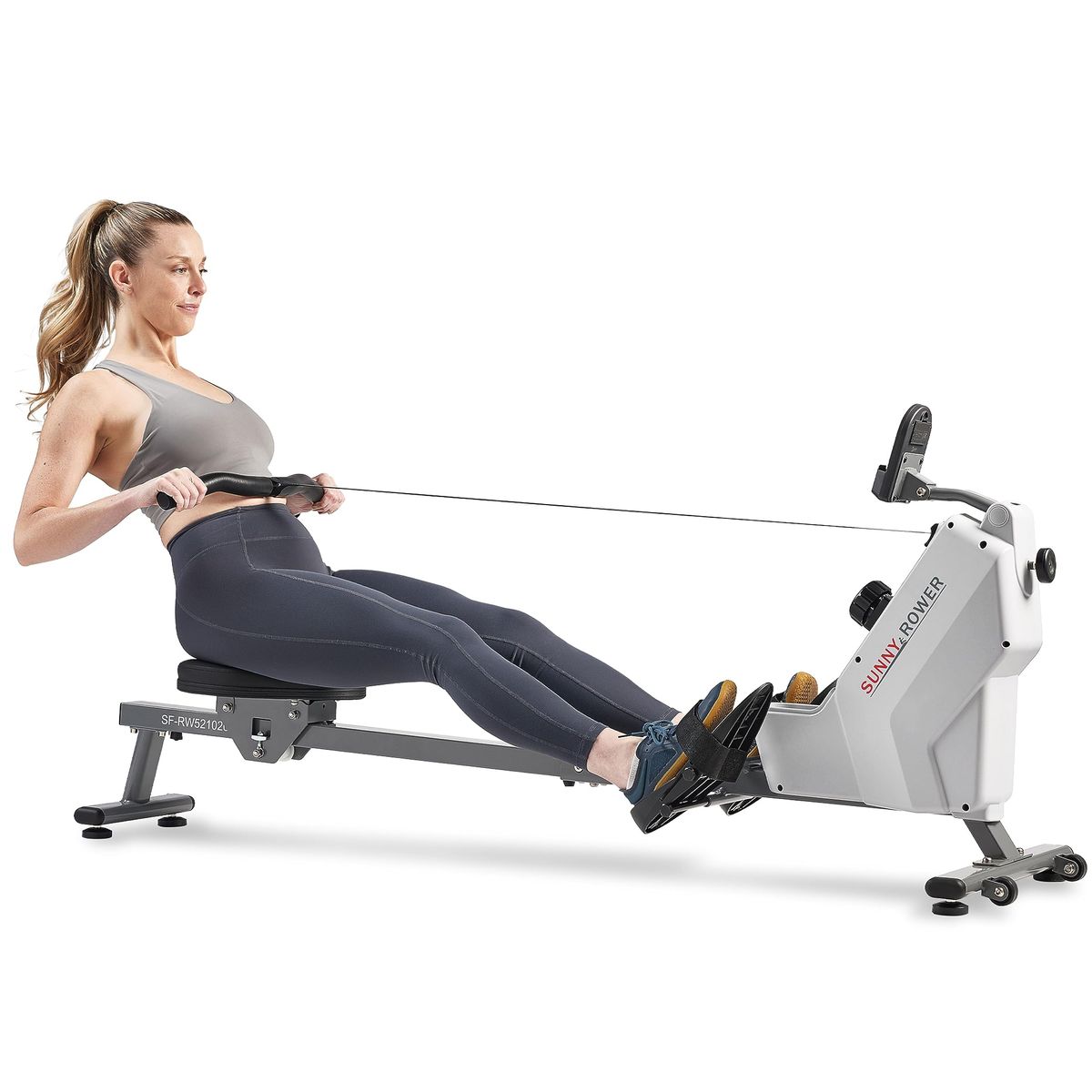Sunny Health & Fitness Magnetic Rowing Machine on a home gym floor