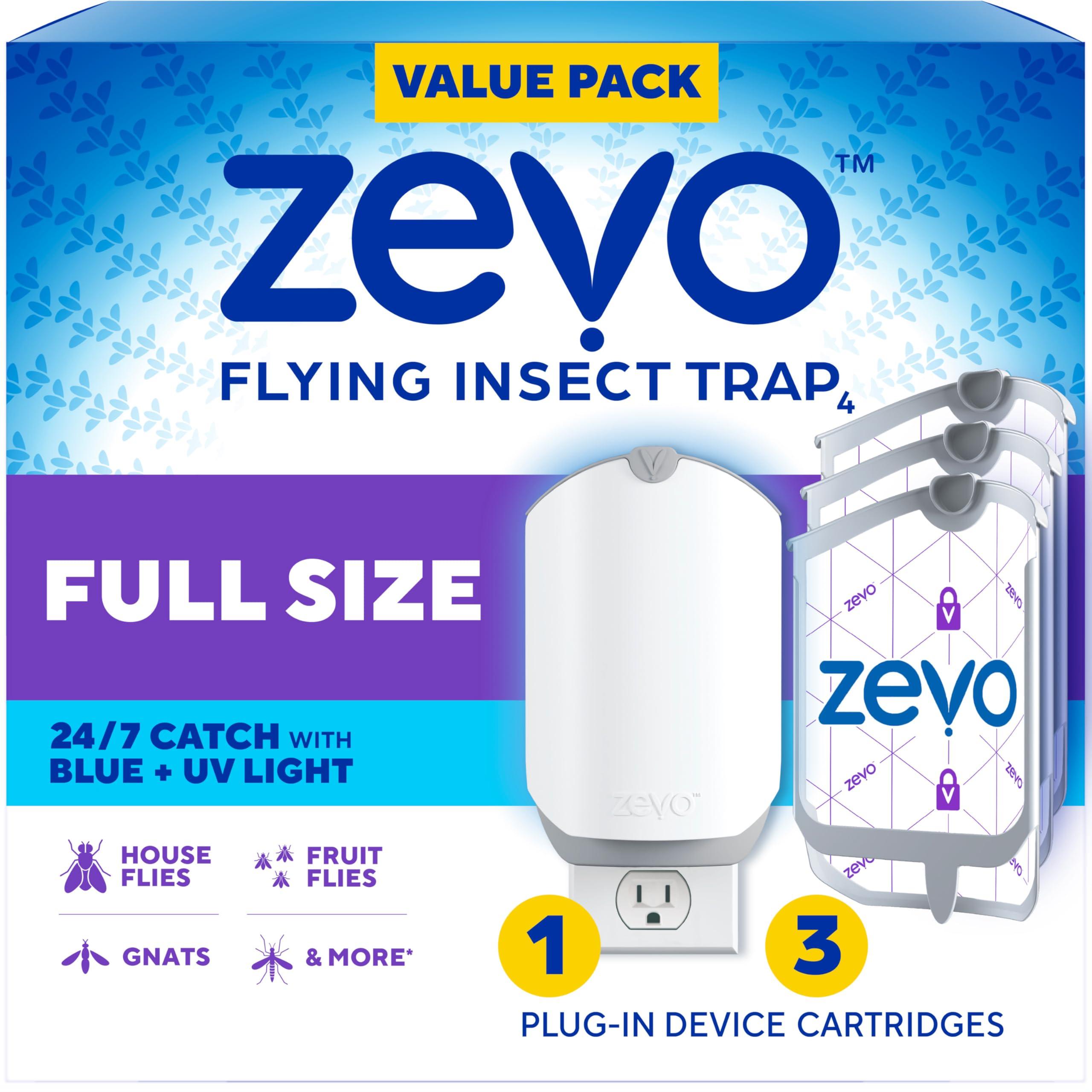 Zevo Flying Insect Trap plugged into a wall outlet with blue UV light activated