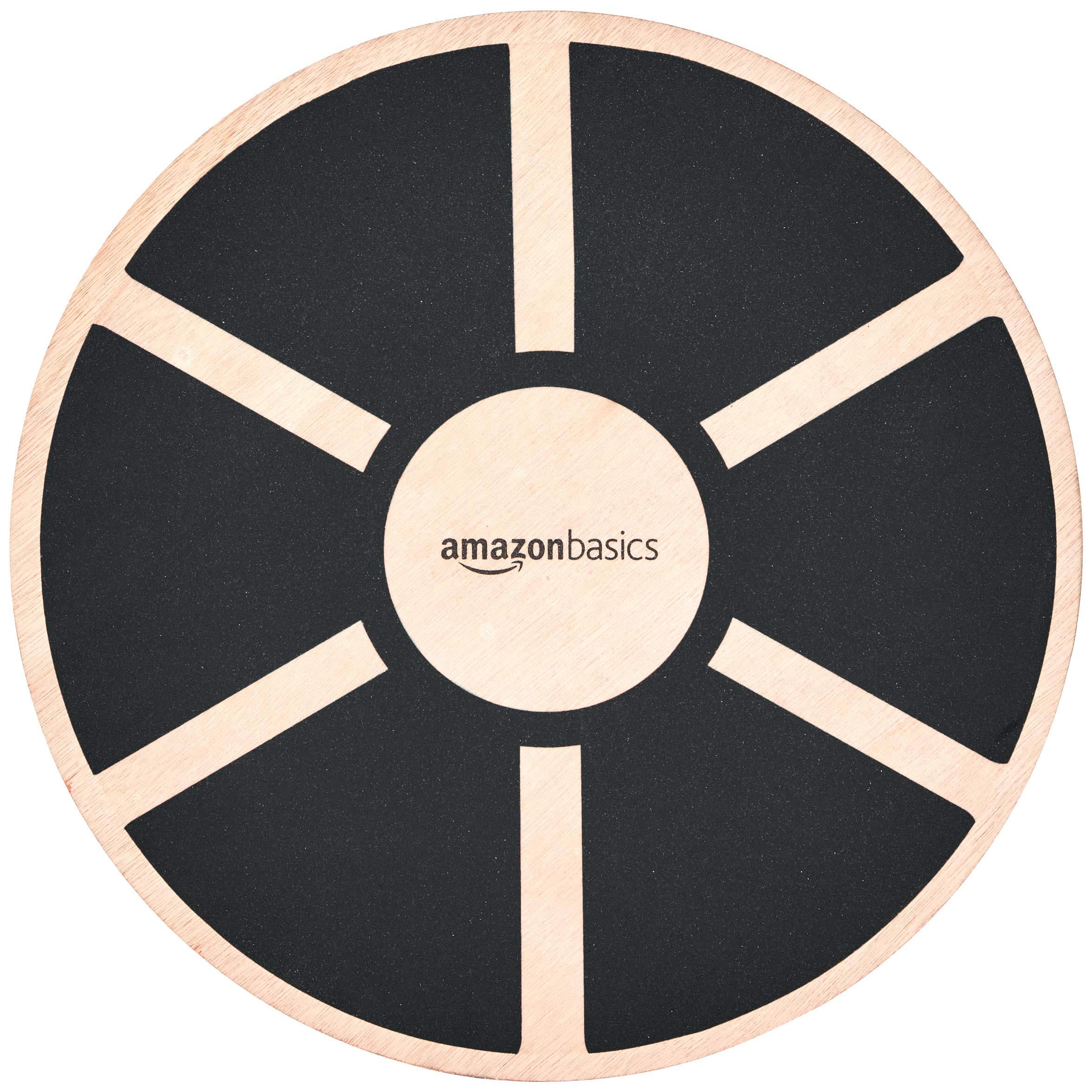Amazon Basics Wood Wobble Balance Trainer Board on exercise floor
