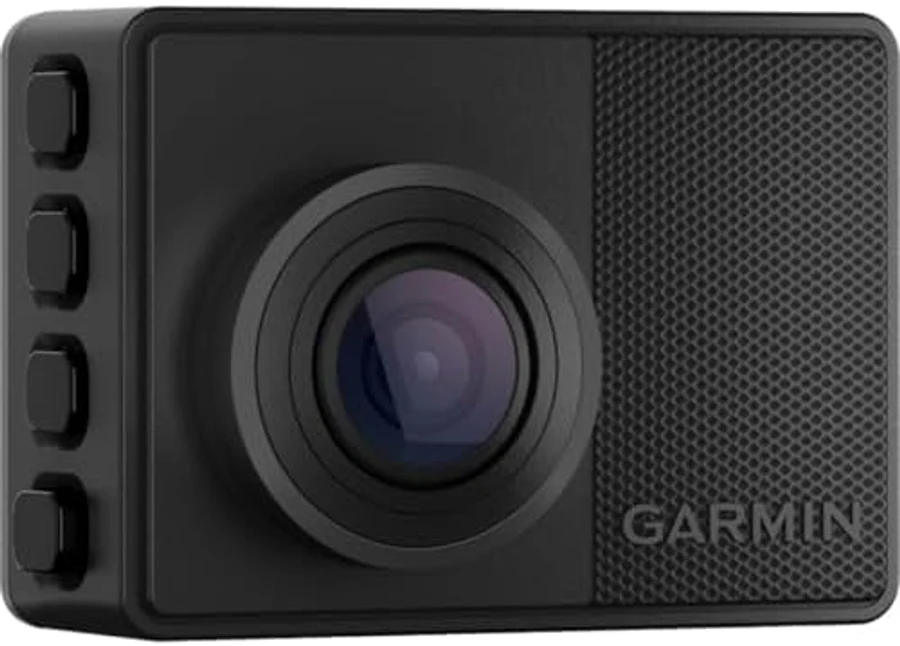 Garmin Dash Cam 67W in compact rectangular form factor showing the distinctive Garmin branding on the right side panel with textured pattern — the 1440p ultra-wide 180-degree FOV mainstream US dash cam pick from Garmin