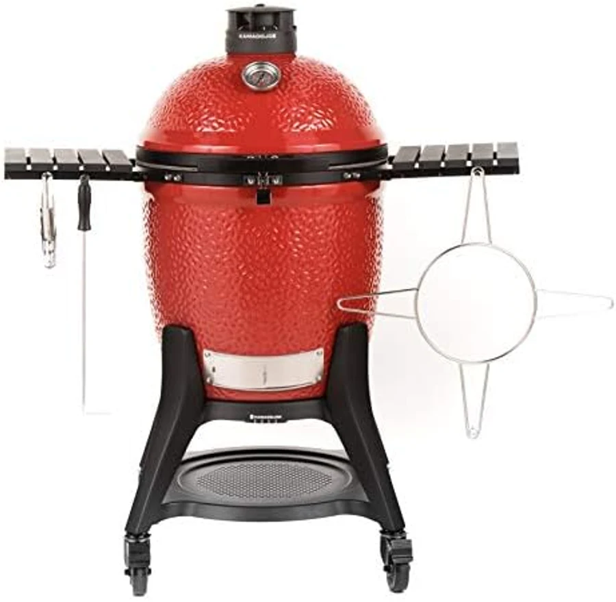 Kamado Joe Classic III red ceramic egg-shaped charcoal grill on heavy-duty galvanized rolling cart with locking wheels, Kontrol Tower top vent visible at the dome, distinctive textured red ceramic body — the patent-pending 2026 ceramic kamado with SlōRoller smoke chamber