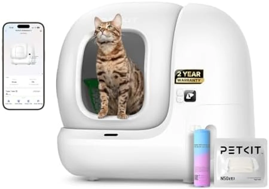 PETKIT PuraMax 2 automatic self-cleaning cat litter box in white with rounded modern design, distinctive 2-year warranty badge visible, ShieldBase 360-degree sealing system, integrated multi-sensor safety panel — the 2024-launch flagship from PETKIT