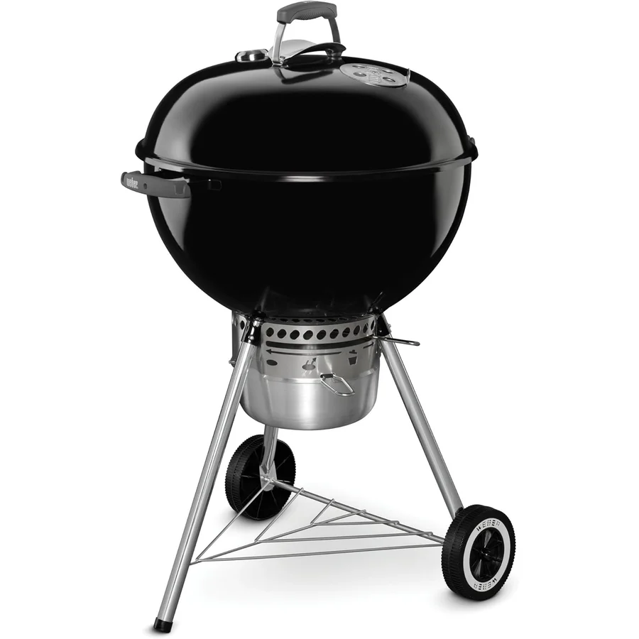 Weber Original Kettle Premium 22-inch black porcelain-enameled charcoal grill with three-leg design, all-weather wheels, glass-reinforced nylon handles, built-in lid thermometer, and One-Touch ash-cleaning system — the proven-since-1952 design refined for 2026